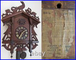 ANTIQUE cuckoo clock AMERICAN CUCKOO CLOCK CO. Carved wood inlay LARGE & WORKS