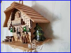 Animated Chalet Cuckoo Clock with moving Wood chopper in original box