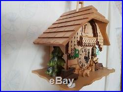 Animated Chalet Cuckoo Clock with moving Wood chopper in original box