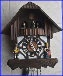 Beautiful Vintage Musical Swiss made Chalet Cuckoo Clock Animated dancers Switze