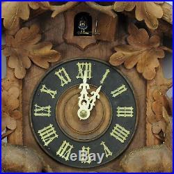 Black forest carved wood cuckoo clock with deers