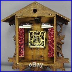 Black forest carved wood cuckoo clock with deers