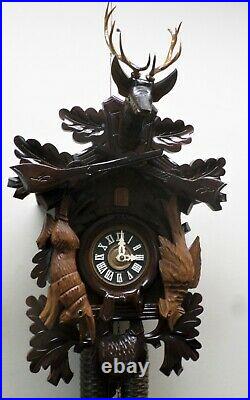 Breathtaking German Black Forest 8 Day Hunter Deer Head Carved Cuckoo Clock