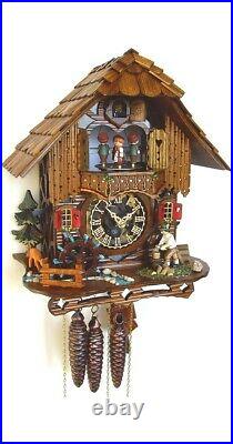 Cuckoo Clock Black Forest house with moving wood chopper and. SC MT 6667/9 NEW