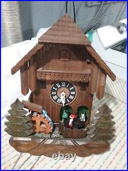 Cuckoo Clock with Dancers and Water Wheel