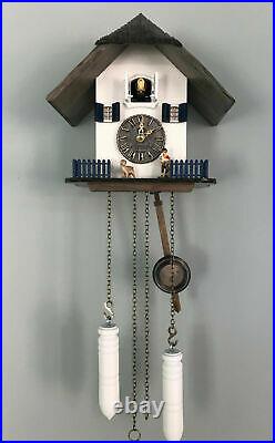 Cuckoo clock black forest North Sea house quarz germany carved thatched roof