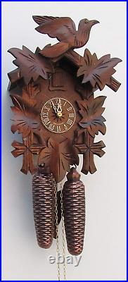 - German Hand Carved Cuckoo Clock with Eight-Day Movement