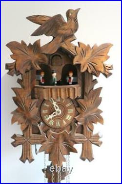 MODERN MUSICAL CUCKOO CLOCK with DANCING PEOPLE CAROUSEL excellent condition