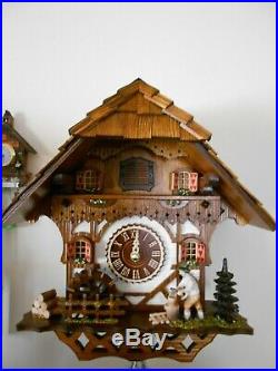 New Original Black Forest Cuckoo Clock House with Music & Wood-Cutter Incl Batt