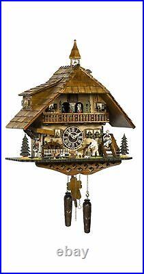 Quartz Cuckoo Clock Black Forest house with moving wood c. TU 4259 QMT HZZG NEW