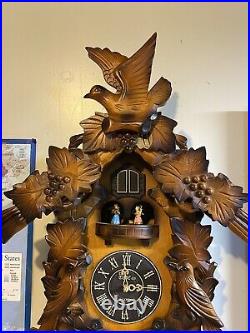 The Time Company Quartz Electric Cuckoo Clock Musical With Turning Dancers (F789)