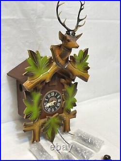 VINTAGE Black Forest Cuckoo Clock Germany DEER HEAD GREEN LEAVES HUNTING