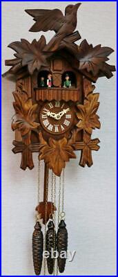 Vintage Black Forest Weight Driven Musical Automaton Carved Cuckoo Wall Clock