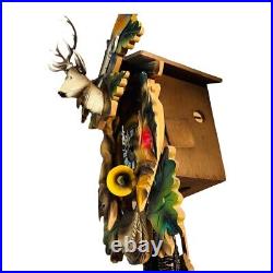 Vintage Early 1950's Cuckoo Clock from Germany This piece has a hunting theme