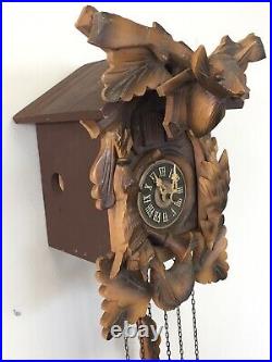 Vintage German Wooden Hunter Themed Cuckoo Clock With Chimes & Music