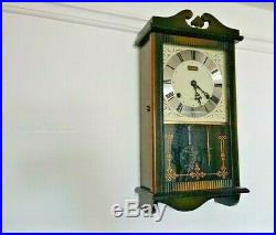 Wall mounted vintage old fashioned clock traditional classic design